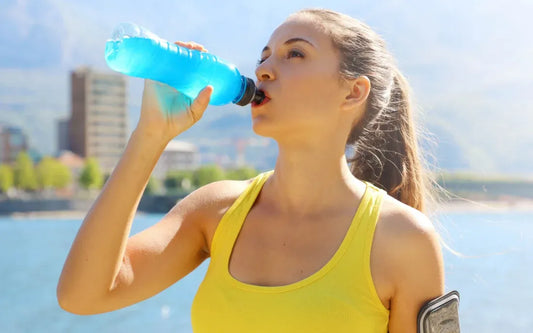 person hydrating with electrolytes