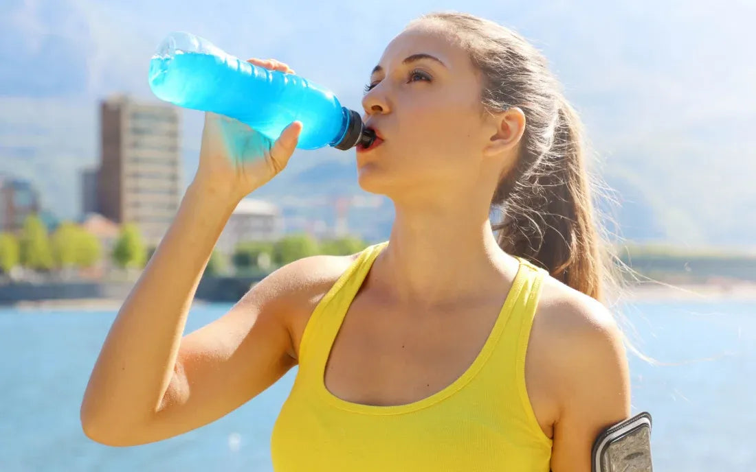 person hydrating with electrolytes