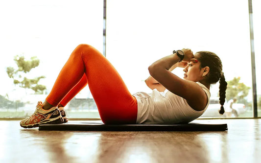 woman-doing-sit-ups-beginner-workout