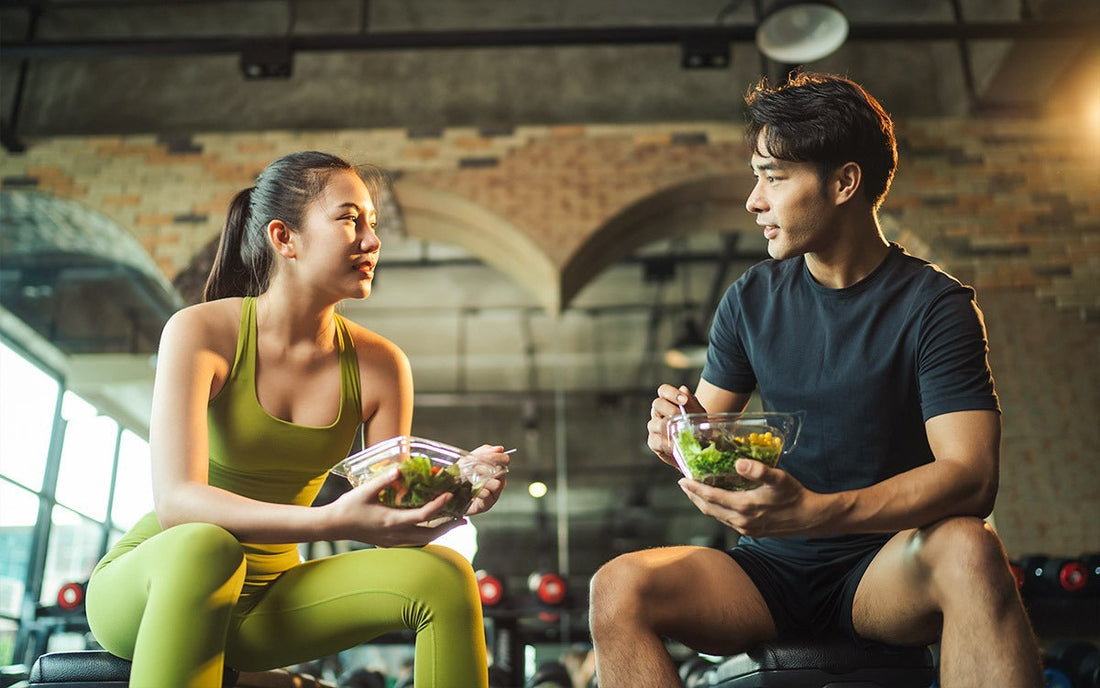Man And Woman Eating Before Workout